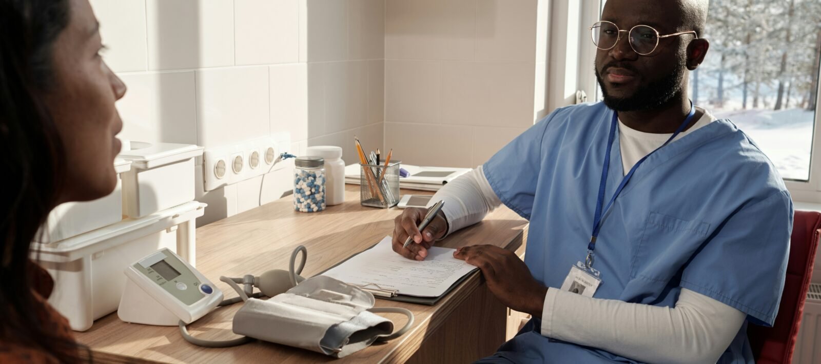 Doctor talking to patient