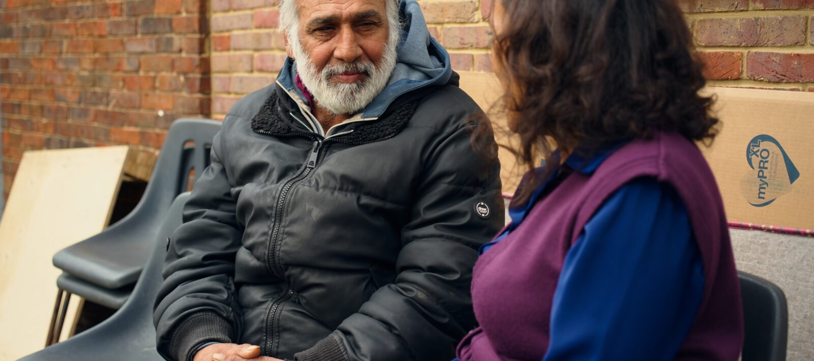 Man talking to support nurse